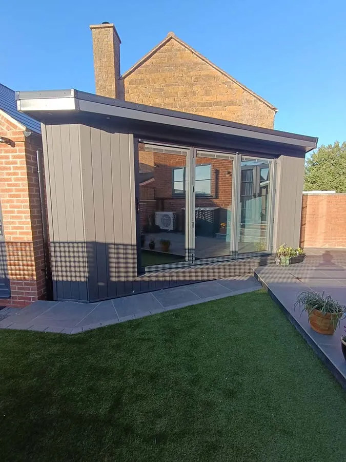 bespoke corner trainglular shaped garden room