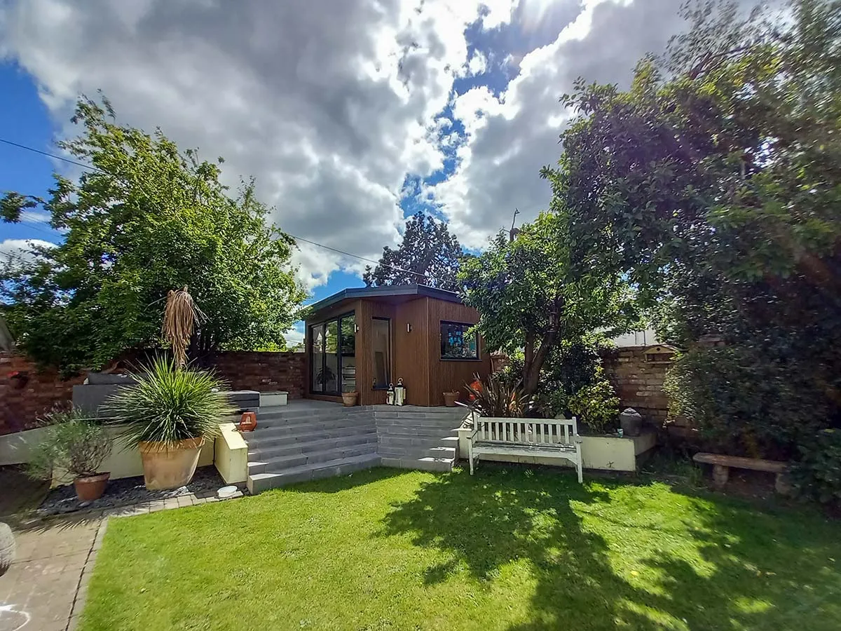 bespoke corner garden room in teak cladding