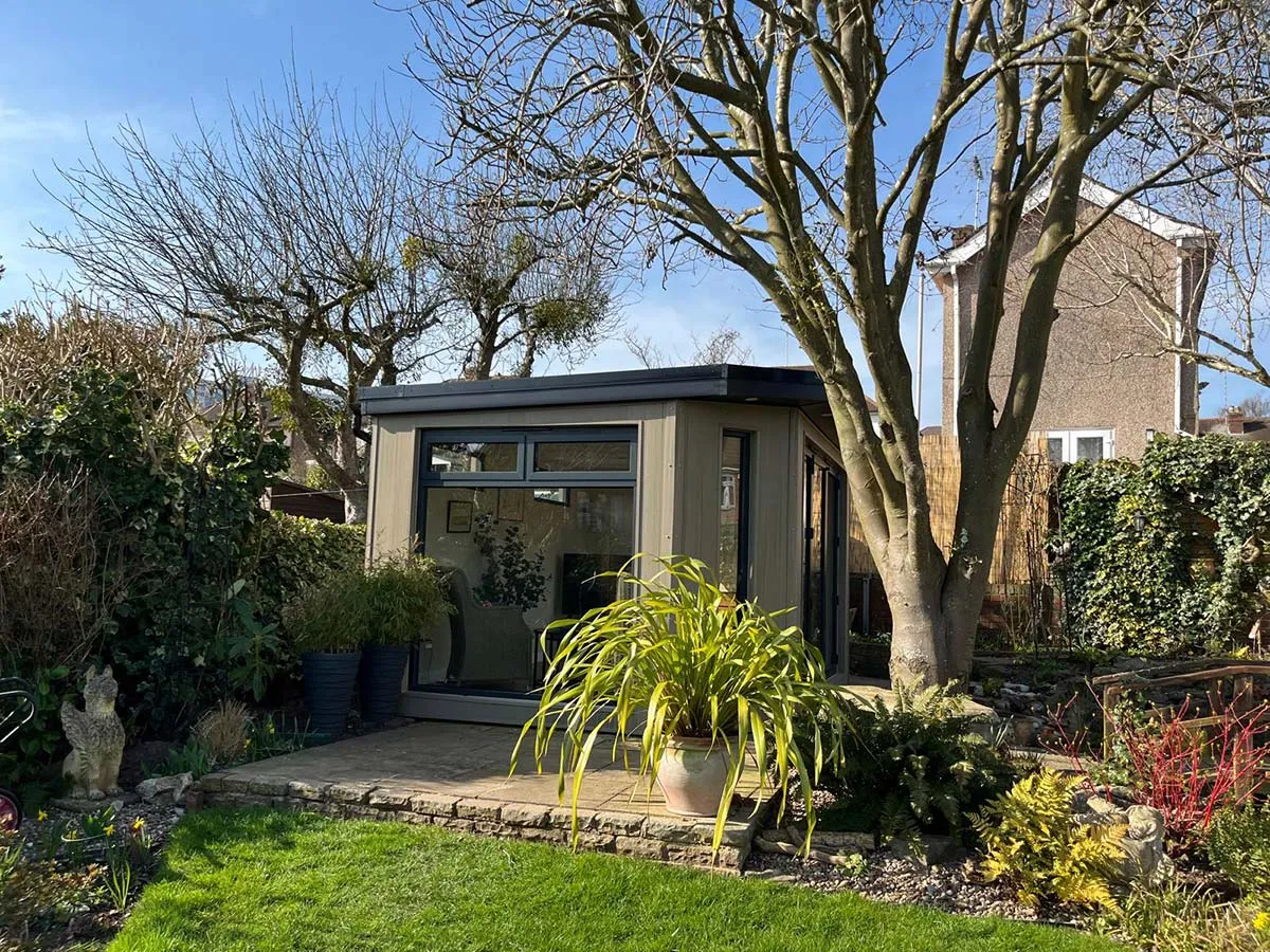 garden room built to fit perfectly in corner of garden