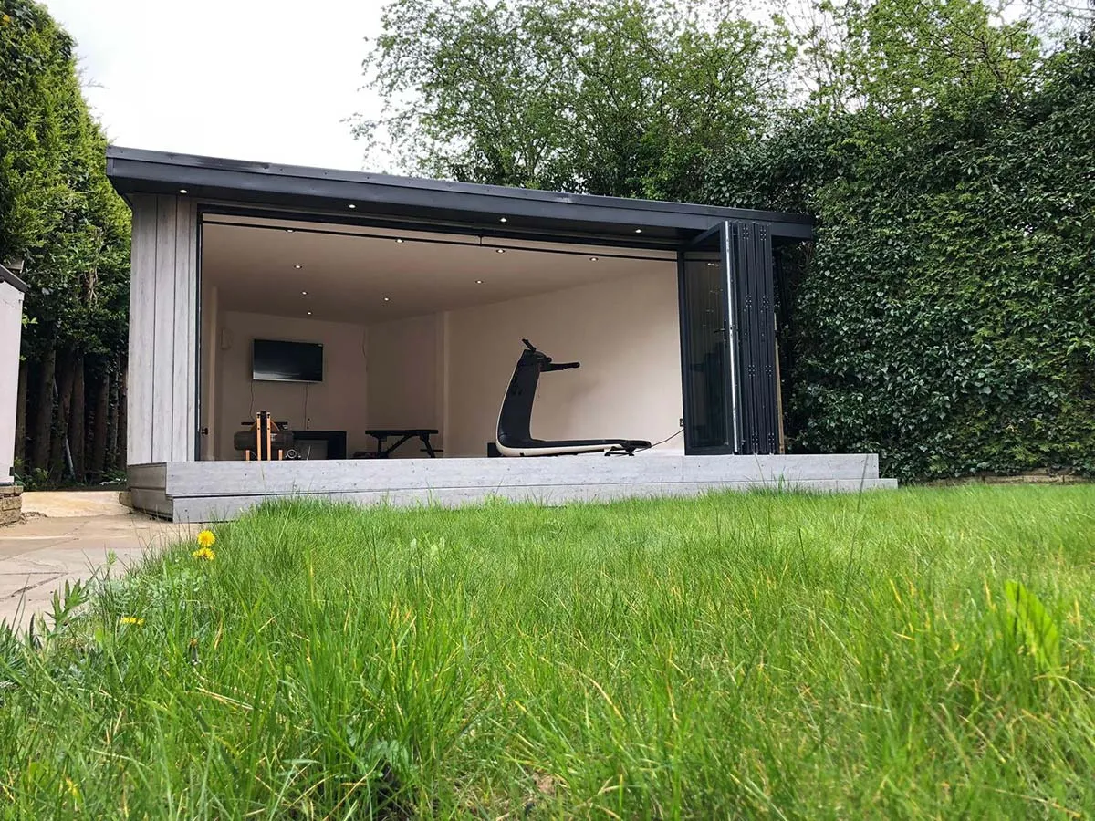 modern garden room built into corner plot