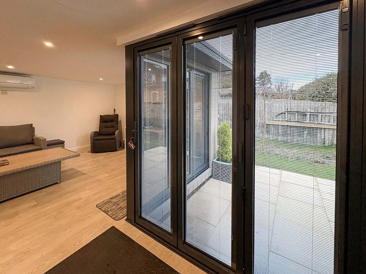 interior of bi fold corner doors in garden room