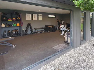 garden room gym with specialist supportive rubber flooring